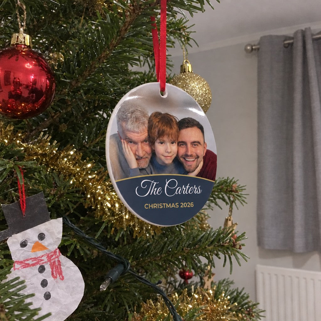 Slate personalised family photo bauble hanging on a Christmas tree
